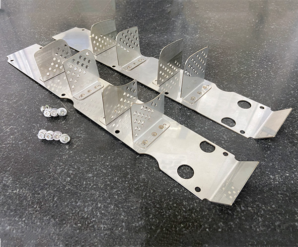 CAM COVER BAFFLE PLATE